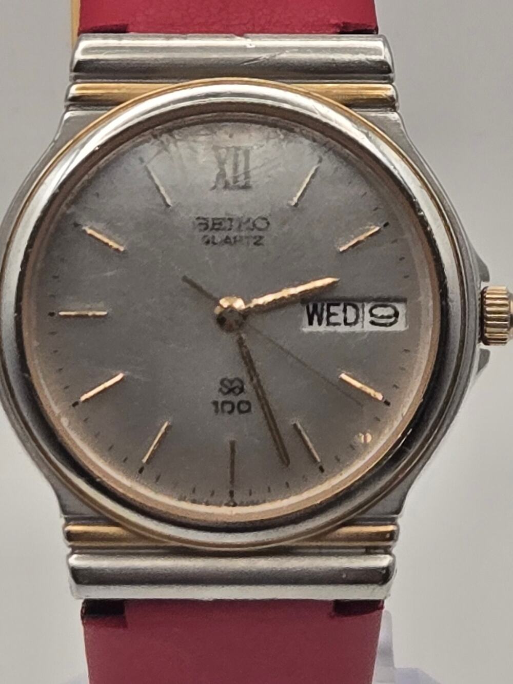 Seiko SQ100 Quartz 8123-6299 Two-Tone Day-Date